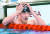 황선우 선수가 27일 일본 도쿄 아쿠아틱스 센터에서 열린 도쿄 올림픽 남자 자유형 200m 결승을 마친 뒤 자신의 기록을 확인하며 손으로 머리를 감싸고 있다. [올림픽사진공동취재단]