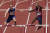 지난 3일 도쿄 올림픽 남자 400m 허들 결선에서 노르웨이의 카르스텐 바르홀름(왼쪽)과 미국의 라이 벤자민이 1, 2위를 다투며 뛰고 있다. [AP=연합뉴스]