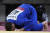 오스트리아 유도 선수 샤밀 보르하슈빌리가 남자 81kg급 동메달결정전에서 승리한 뒤 바닥에 엎드려 흐느끼고 있다. 연합뉴스 