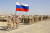 3국 합동 군사훈련에 앞서 도열한 러시아군. AP=연합뉴스