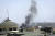 15일(현지시간) 아프가니스탄 카불 주재 미국 대사관 옆에서 연기가 피어오르고 있다. AP=연합뉴스