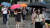 서울을 비롯한 수도권 등 전국 내륙 곳곳에 강한 소나기가 내릴 것으로 예보된 18일 오전 서울 영등포구 여의도 버스 환승센터에서 우산을 쓴 시민들이 출근길 발걸음을 재촉하고 있다. 뉴스1