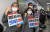 국민의힘 의원들이 19일 서울 여의도 국회 문화체육관광위원회 앞에서 언론중재법 개정안에 대해 반대 시위를 하고 있다. 연합뉴스