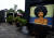 지난 7월 나이지리아 수도 라고스의 한 야외 전시장에 아프리카 여성이 암호화폐가 그려진 선글라스를 쓴 여성의 그림이 그려져 있다. [AFP=연합뉴스]