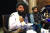 탈레반의 대변인 자비훌라 무자히드와 통역을 맡은 압둘 카하르 발키. AFP=연합뉴스