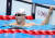 조기성이 25일 오전 일본 도쿄 아쿠아틱센터에서 열린 2020 도쿄 패럴림픽 수영 남자 50m 평영(SB3) 예선 경기 후 전광판을 바라보고 있다. 사진공동취재단