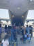 25일 아프가니스탄 카불공항에서 한국으로 이송될 아프간인들이 수송기에 탑승하고 있다. 외교부 제공=뉴시스 
