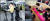 강성국 법무부 차관과 뒤에서 우산을 들고 있는 법무부 직원(왼쪽 사진), 지난해 2월 소년원생의 세배를 받은 추미애 당시 법무부 장관과 김오수 당시 법무부 차관(현 검찰총장). [중앙포토]