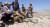 반탈레반 무장 세력인 ‘아프가니스탄 민족저항 전선’ 대원들이 판지시르 계곡 언덕에서 주변을 감시하고 있는 모습을 찍은 사진을 아프간 국민저항 전선이 공개했다. [로이터=연합뉴스]