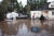 지난 2일 허리케인 아이다로 인한 폭우에 집이 물에 잠겨 피신한 사람들을 보트로 구조하고 있다. 연합뉴스