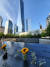9/11 테러 20주년을 앞둔 8일(현지시간) 미국 뉴욕 '9/11 추모 공원'에 있는 '메모리얼 풀'에 새겨진 희생자 이름 위에 꽃이 놓여 있다. [뉴욕=박현영 특파원]