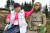  일본군 위안부 피해자인 故 안점순 할머니가 독일 레겐스부르크 비젠트 네팔 히말라야 파비용 공원에 설치된 평화의 소녀상을 쓰다듬고 있다. 수원시