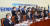 16일 국회에서 열린 더불어민주당 위드코로나 TF 1차회의에서 윤호중 원내대표(앞줄 오른쪽에서 3번째)을 비롯한 참석자들이 기념촬영을 하며 "소상공인 자영업자 파이팅"을 외치고 있다. 임현동 기자