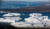 그린란드 일루리삿 빙하에서 떨어져나온 거대한 빙산들이 16일 대서양으로 흘러들어가고 있다. 사진 가운데 보이는 도시는 그린란드 제3의 도시인 일루리삿. 로이터=연합뉴스