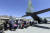 지난달 25일(현지시간) 아프가니스탄 카불 공항에서 공군 C-130J 수퍼허큘리스 수송기에 탑승하기 위해 아프간 조력자와 가족이 대기하고 있다. 공군