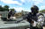 16일 강원도 인제군 육군과학화전투훈련단(KCTC)에서 Army TIGER 4.0 전투실험이 진행된 가운데 군 관계자들이 전투수행 시연을 하고 있다. 사진공동취재단