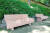 서울 창덕공원에 설치된 화장품 공병 업사이클링 벤치 ‘커브 벤치’. 아모레퍼시픽의 플라스틱 화장품 공병과 삼표그룹의 초고성능 콘크리트인 ‘UHPC’를 활용해 제작됐다. [사진 아모레퍼시픽]