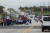 5일 바이든 대통령 행렬이 지나는 미시간 하월의 도로변에서 시위를 벌이는 트럼프 지지자들. 로이터=연합뉴스