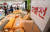 5일 서울 동작구 태평백화점을 찾은 시민들이 백화점 영업 중단을 앞두고 할인 판매되는 제품들을 살펴보고 있다. 연합뉴스
