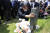 윤석열 전 검찰총장이 지난 7월 17일 오전 광주 북구 운정동 국립5·18민주묘지에서 참배를 마친 뒤 박관현 열사 묘비를 어루만지고 있다. 뉴스1