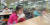 학교에서 급식, 돌봄 등의 업무를 하는 교육공무직 노동자들이 총파업에 나선 20일 서울 시내 한 초등학교에서 학생들이 대체 메뉴로 준비된 샌드위치와 쥬스를 먹고 있다. [사진 공동취재단]