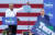 지난 23일(현지시간) 버락 오바마 전 미국 대통령(왼쪽)이 버지니아 리치먼드 커먼웰스대에서 열린 민주당 주지사 후보의 유세 현장을 찾아 지지 연설을 하고 있다. [로이터=연합뉴스]