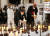 문재인 대통령과 김정숙 여사가 29일(현지시간) 이탈리아 로마 산티냐시오 디 로욜라 성당에서 열린 '철조망 평화가 되다' 전시회에서 한반도를 형상화한 전시작품의 LED 촛불 점등식을 하고 있다.연합뉴스