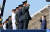 지난해 국군의 날 기념식에서 문재인 대통령이 훈포장 및 표장 수여자들에게 거수경례로 답하고 있다. [청와대사진기자단]