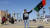 10번째 리비아 혁명기념일을 하루 앞둔 지난 2월 16일 수도 트리폴리에서 한 리비아 소년이 국기를 들고 있다. [EPA=연합뉴스]