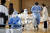 지난 2일 오전 광주 북구 한 중학교에 마련된 신종 코로나바이러스 감염증(코로나19) 임시선별진료소에서 교직원과 학생들이 진단검사를 받고 있다. 광주 북구 제공. 뉴스1