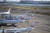일본 정부가 입국 규제 완화를 발표한 지난 8일, 일본 하네다 공항에 서 있는 비행기들. [AFP=연합뉴스]