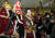 국가혁명당 허경영 명예대표가 18일 오후 서울시 강서구 김포도시철도 김포공항역에서 장군 옷을 입고 지지자들과 기념촬영을 하고 있다. 연합뉴스