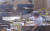 지난 7월 27일 대전시 서구의 한 은행에서 70대 여성(노란색 원)이 보이스피싱 피해를 당하기 직전 출동한 경찰관, 은행 직원과 대화를 나누고 있다. [사진 대전경찰청]