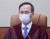 김기영 헌법재판관이 지난 25일 오후 서울 종로구 헌법재판소 심판정에 입장해 자리에 앉아 있다. 연합뉴스