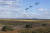 러시아군과 발라루스군이 지난 9월 11일 러시아의 니즈니 노브고로드 지역에서 양국 연합군사훈련인 자파드 2021을 진행하는 도중 하늘에는 헬기 편대가 날고, 지상에는 자주포가 이동하고 있다. AP=연합뉴스 