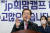 홍준표 국민의힘 의원이 지난달 8일 오전 서울 영등포구 여의도 BNB타워에서 열린 JP희망캠프 해단식에서 인사말을 하고 있다. 국회사진기자단