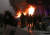 알마티 도심에서 벌어진 반정부 시위에서 경찰차가 불에 타고 있다. 로이터=연합뉴스