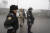 지난 8일 카자흐스탄 최대도시 알마티에서 경찰과 군인들이 도로를 통제하고 있다. [AP=연합]