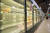 한 쇼핑객이11일 미국 크랜베리 타운쉽의 한 식료품점에서 텅 비어있는 냉동식품 냉동고 앞을 지나가고 있다. [AP=연합뉴스]
