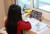 지난해 12월 20일 오전 서울시내 한 초등학교 3학년 학생이 집에서 원격수업을 받고 있다. [연합뉴스]