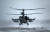 러시아 남부전구의 공군 정찰 공격 헬기 A Ka-52 '앨리게이터'가 19일 우크라이나 접경지역인 로스토프 인근의 비행장에서 기동 훈련을 하고 있다. 로이터=연합뉴스