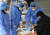 26일 광주광역시 북구 보건소 선별진료소에서 신속항원검사를 받는 한 시민이 간호사의 안내를 받아 스스로 검체 채취를 하고 있다. 프리랜서 장정필