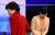 2012년 12월 10일 KBS스튜디오에서 열린 2차 TV토론에서 박근혜 새누리당 대선후보가 이정희 통합진보당 대선후보와 인사를 나눈 후 자리로 돌아가고 있다.  [ 사진공동취재단 ]