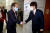 홍준표 국민의힘 의원(왼쪽)이 지난해 11월 5일 오후 서울 용산구 백범김구기념관에서 열린 제2차 전당대회에 참석하기 전 이준석 국민의힘 대표와 악수를 나누고 있다. 국회사진기자단