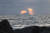 을왕리 해수욕장에서 촬영한 검은 구름 사이로 비치는 빛 내림 현상. [사진 조남대]