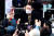 국민의힘 윤석열 대선 후보가 18일 오후 대구 달성군 대실역 사거리에서 열린 유세에서 지지자들과 악수하고 있다. [공동취재]