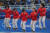 베이징올림픽 여자컬링에서 은메달을 이끈 후지사와(오른쪽)이 팀원들과 시상대에 점프해 오르고 있다. [로이터=연합뉴스]