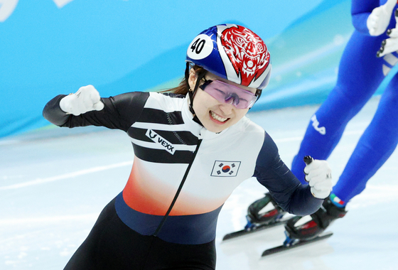 Choi Min-jeong reacts after winning the women's 1,500-meter final during the short track speed skating competition at the 2022 Winter Olympics on Wednesday at Capital Indoor Stadium in Beijing. [AP/YONHAP]
