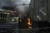 우크라이나 동부 도시 마리우폴에서 우크라이나군 차량이 러시아의 공격을 받아 불타고 있다. [AP=연합뉴스] 