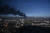 24일 우크라이나 하리키우 인근 군공항에서 검은 연기가 피어오르고 있다. AFP=연합뉴스
